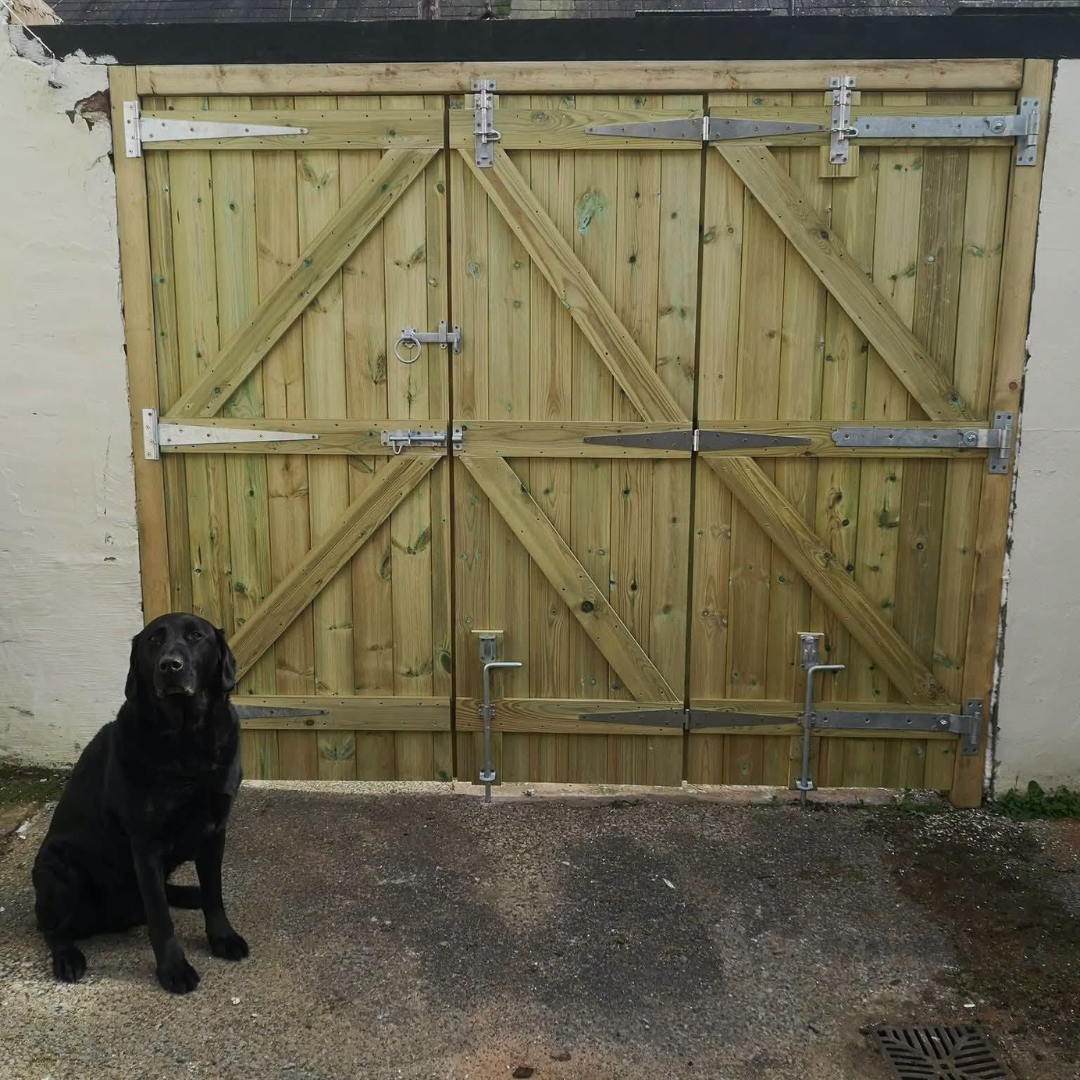Wooden gate installation by a carpenter in Cumbria
